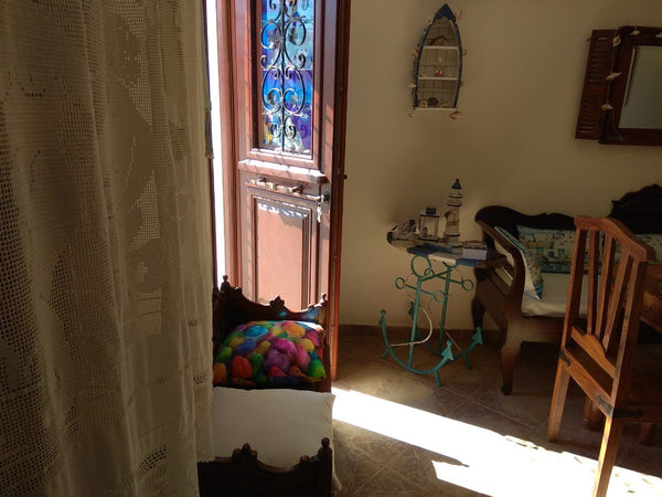 The owner Yiannis, welcomes you to his house on the beautiful island of Santorin  Cozy Traditional Cycladic House Entire rental unit vacation rental 32688704