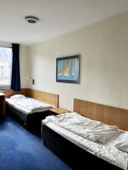 Hotelroom for two people, with its own bathroom and two separate beds.  Cheap hotelroom for two people. Room in hotel vacation rental 638420226624514202