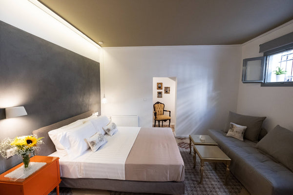 Athenian Yard Suites is an old Athenian House (1907), fully renovated. Located i Heraklion, Greece Elite Three Bed Studio Room in aparthotel vacation rental 28739154