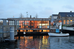 Wonderfull sunny boathouse. big New York style windows from floor to ceiling in  Copenhagen, Denmark Boathouse with evening sun Copenhagen K Boat vacation rental 23164106