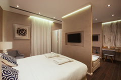 Our Deluxe Suite is air conditioned and decorated with modern minimal furniture.  Deluxe Suite with Town View - Consolato Private room vacation rental 21704666