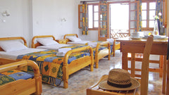 Spacious and bright studio opening to a sunny balcony overlooking Perissa town a Perissa, Greece Family studio apartment with balcony • Almyra Entire rental unit vacation rental 6896972