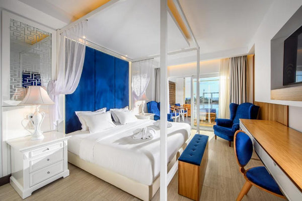 Set on the edge of the Aegean Sea, Radisson Blu Beach Resort in Milatos is the i  Radisson-Signature GuestRoom Sharing Pool Sea View Private room in resort vacation rental 54204800