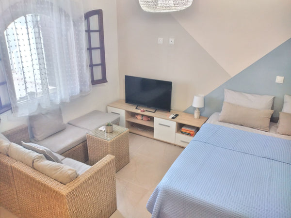 Take a break, feel like a local and relax in this beautiful cottage. Enjoy this  Milatos Beach, Greece Kertoshouse 🐬No4 Beautiful apartment with patio Private room in rental unit vacation rental 581064375426160344
