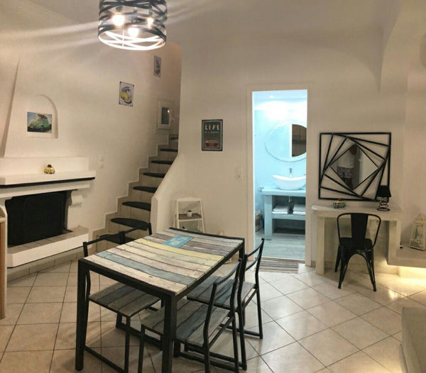 This cozy house of 58 sq.m  consists of ground & first floor that are connected  Thera, Greece 