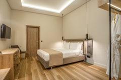 This suite can accommodate up to 4 people or a family, has a small kitchenette,  GR Philia Btq Hotel Jounior Suite Garden View, patio Private room in bed and breakfast vacation rental 50154515