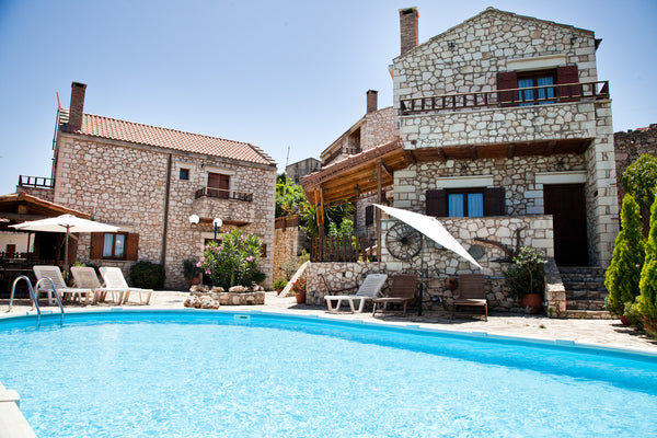 Built of local stone and wood, the family-run Tsivaras Villas are located in Tsi  Tsivaras Villas ( Family - friendly ) Entire villa vacation rental 47869439