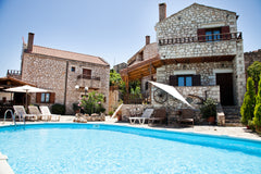 Built of local stone and wood, the family-run Tsivaras Villas are located in Tsi  Tsivaras Villas ( Family - friendly ) Entire villa vacation rental 52348904