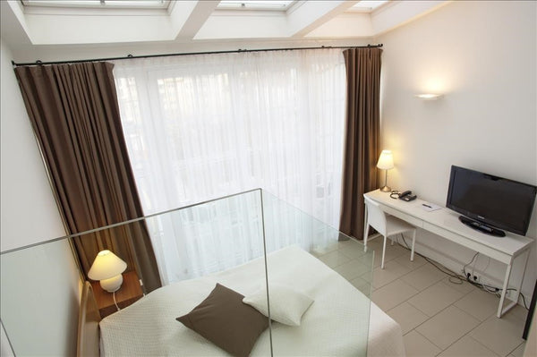 A small family owned boutique hotel / B&B in the hearth of Vienna. In one of the Vienna, Austria Single Room with balcony & garden view Room in boutique hotel vacation rental 36156954