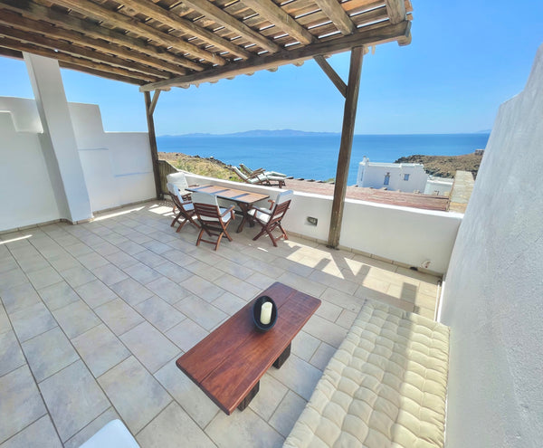 The house is located next to a crystal-clear water beach with stunning view to A Pireas, Greece 