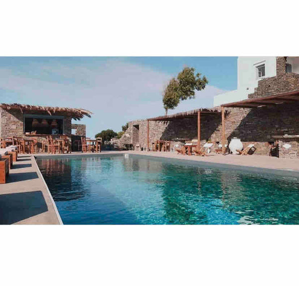 The studio includes a double bed, fully equipped kitchen, tv, a/c, bathroom and  Greece BeachFront Studio 