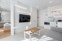 Flanking the kitchen is your luxurious living room with a 40” SMART TV with Netf GR NS PLACE Monastiraki Entire serviced apartment vacation rental 53486450