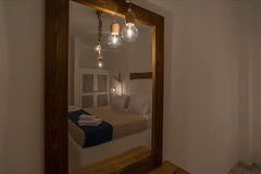 The sea view apartment suite, having 1 bedroom and a spacious living room area,  Greece Apartment with Side Sea View Room in hotel vacation rental 32655866