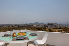 Step into your private haven, complete with a double bed and a balcony overlooki  King Suite - Horizon Luxury Suites Entire condo vacation rental 39648183