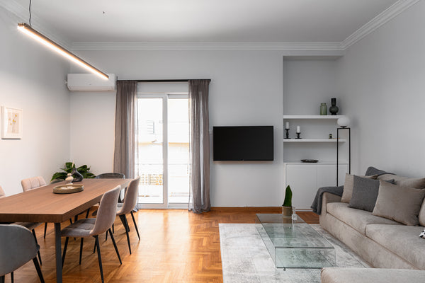 Beyond the front door is an airy, open-plan living area, where the wooden dining Athens, Attica, Greece Athenian Calm Residence Entire condo vacation rental 629550950583358027
