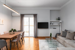 Beyond the front door is an airy, open-plan living area, where the wooden dining Athens, Attica, Greece Athenian Calm Residence Entire condo vacation rental 629550950583358027