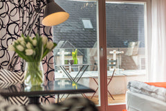 Our apartment is a mix of modern furniture and cosy atmosphere with a private ba  Modern City Apartment Balcony Entire rental unit vacation rental 41393576