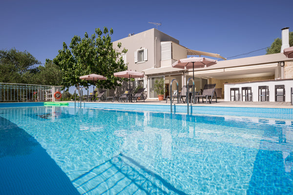 Villa Almyros is situated on a hill aprox 1.5 km away from the center of Georgio  Luxury villa with  pool close to the beach Entire villa vacation rental 54133788