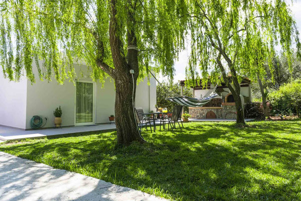 Liofyto is a fresh contemporary house surrounded by greenery, offering absolute   Liofyto House | Private Garden, Near The Beach Entire home vacation rental 34379963