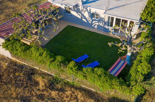 Feel like home away from home in this 120square metre house with a private fence  Petrakis Afrathias garden house Entire home vacation rental 46467302