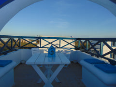 Just a stroke away from the most beautiful and popular beach of the whole island Thera, Greece Sunny, sea view apartment Cycladic home vacation rental 9770243
