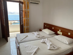 On a great spot, with an impressive view of the harbor, the centre of Pigadia an Greece Dolphin Apartment (2 rooms) with sea view #3 Entire rental unit vacation rental 51698107