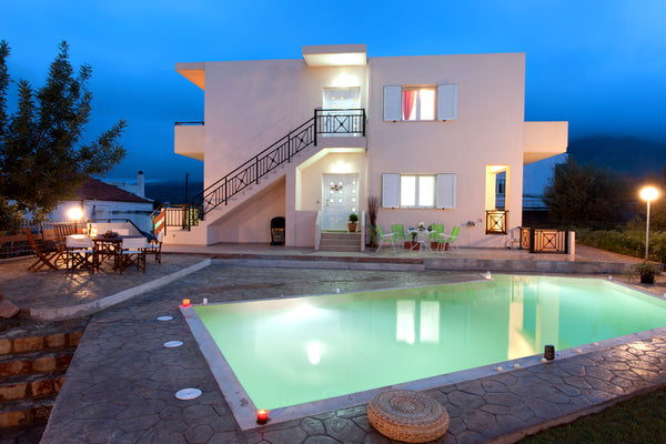 Guests have access to a  big yard with  lawn and flowers  in front of the villas Chania, Greece Downstairs 120sq apartment for 5 persons with pool Entire villa vacation rental 4858064