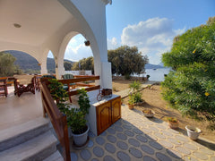 Full beach front house for peaceful holidays. The house is located at Emporios v Greece Villa Evdokia Entire home vacation rental 44224052