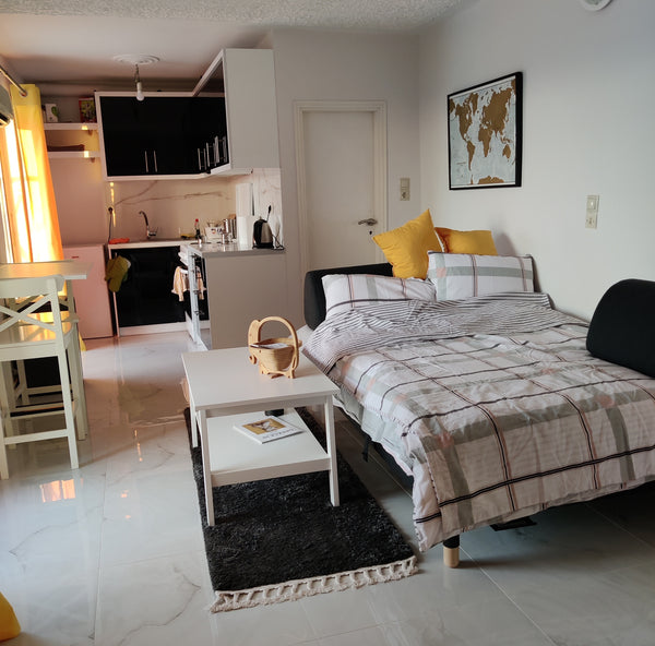 Enjoy a peaceful and relaxing start to your day with an ice coffee and a cooling Athens, Greece Penthouse studio for a blissful getaway Entire rental unit vacation rental 582330021593555702