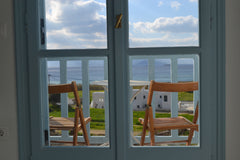 Small Cycladitic room with stunning sunset and sea view, located at the end of t  Plaka's Petite Private room in cycladic house vacation rental 51595247