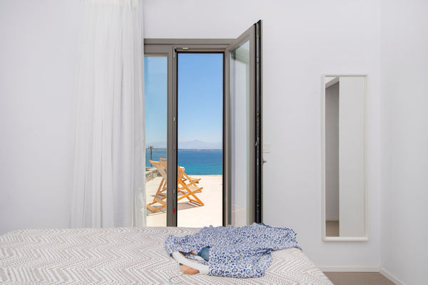 Spacious suite, 50 sq. m. in total, with one bedroom and a living room with a ki Patima, Greece Superior One Bedroom Sea View Suite Entire serviced apartment vacation rental 44158237