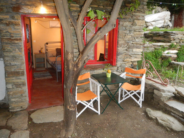 LemonTreeAndros is located in a valley right at the Center of Batsi Village by a Athens, Greece Lemon Tree Home 