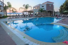 The magnificent view of Agioi Apostoloi bay, the excellent location on the beaut  Golden Bay - Standard Apartment (semi-basement) Private room in serviced apartment vacation rental 564260436699336556