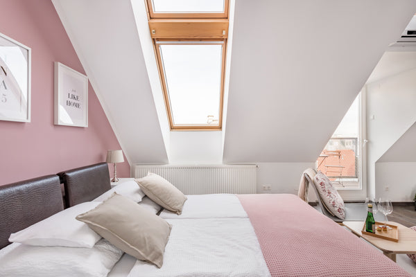 Wake up on the king-size bed under a sloping roof with skylights filling the spa Vienna, Austria Vienna Design Apartment Entire rental unit vacation rental 28041819
