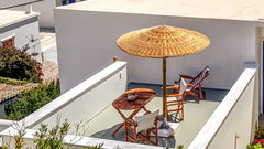 This self-catering studio in Tinos is situated in a beautiful fishing village(Pa Tinos, Greece Studio with Rooftop Terrace | Nearby Sandy Beaches Cycladic home vacation rental 18718582