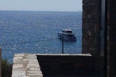 The Villa  is located by  Koundouros on the front of blue-green translucent wate Athens, Greece Sea & Stone-Sea View Luxury Villa- AMA :189312 Cycladic home vacation rental 14456246
