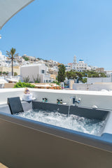 A fabulous suite with private Outdoor Hot Tub to choose for your vacation in San  Top Suite with Outdoor Hot Tub by Ladas Pyrgos Room in serviced apartment vacation rental 38566308