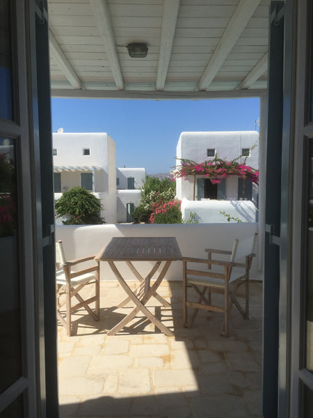 Offers an ideal setting for a dream vacation. Located in the beautiful area of   Athens, Greece Ornos white house Entire condo vacation rental 12166520