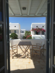 Offers an ideal setting for a dream vacation. Located in the beautiful area of   Athens, Greece Ornos white house Entire condo vacation rental 12166520