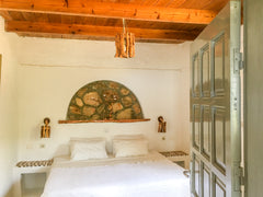 A great family apartment comprising double bedroom and a sofa in the living area  Studio 16 with Sarakiniko Views and Great WiFi Entire serviced apartment vacation rental 47793260