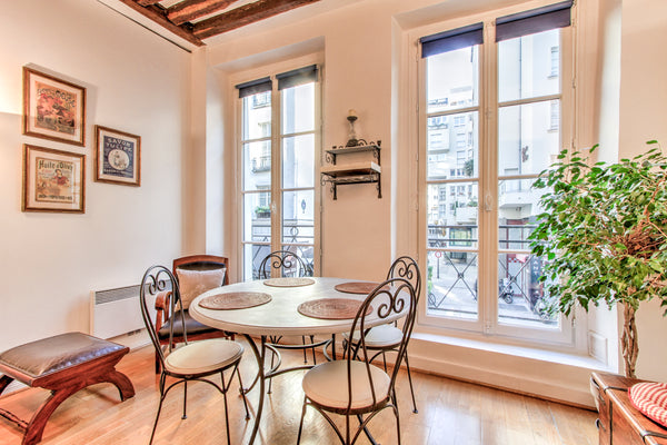 The living room has two large windows overlooking lively rue St Martin and is pe Paris, France Charming one bedroom Apt. Le Marais - Saint-Martin Entire rental unit vacation rental 5946053