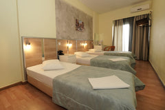 <b>License number</b><br />0206Κ013Α0023400 GR Triple Room with city view Room in hotel vacation rental 616624933060373743