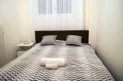 Small cosy room with new big bed. Akropolis in 5 minutes walk.You share bathroom Peiraiá, Attiki, Greece Quiet room under Akropolis Private room in rental unit vacation rental 21752881