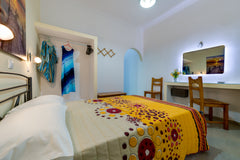 Akis Hotel is a family owned hotel located in Kamari, the most beautiful beach o  Akis Hotel - Double or Twin Room Private room in bed and breakfast vacation rental 551985554495392599