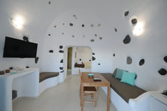 Deluxe Double Room, decorated in white hues, accommodates up to 3 adult guests.< Fira, Greece Deluxe Double Room | Sea & Sunrise View [25 m²] Entire rental unit vacation rental 7866763