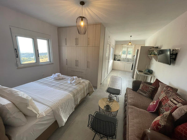 Feel the authentic cretan hospitality! The one-bedroom house has minimal design  Rethimnon, Greece Aglaia Holiday Home Entire home vacation rental 671723163907877543