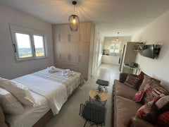 Feel the authentic cretan hospitality! The one-bedroom house has minimal design  Rethimnon, Greece Aglaia Holiday Home Entire home vacation rental 671723163907877543