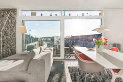Gaze out at the impressive view of the city towers from the floor-to-ceiling win Copenhagen, Denmark Enjoy vibrant Copenhagen from a Sunny Penthouse Entire loft vacation rental 1107046