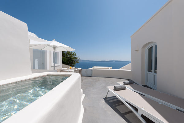 Live the dream in an elegant and modern, island villa with a veranda high above  Oia, Greece One bedroom villa with hot tub and Caldera view Entire villa vacation rental 11709079