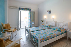 Our Standard Room with Kitchenette encompasses our signature hospitality with a   Standard Room with Kitchenette - Blue Sea Hotel Room in hotel vacation rental 41921627